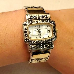 Geneva Platinum Wavy Face Ladies Bangle Watch